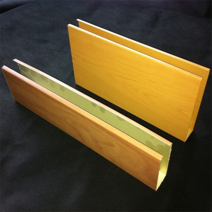 Two woodgrain aluminum U-shaped baffle samples showing their open profiles