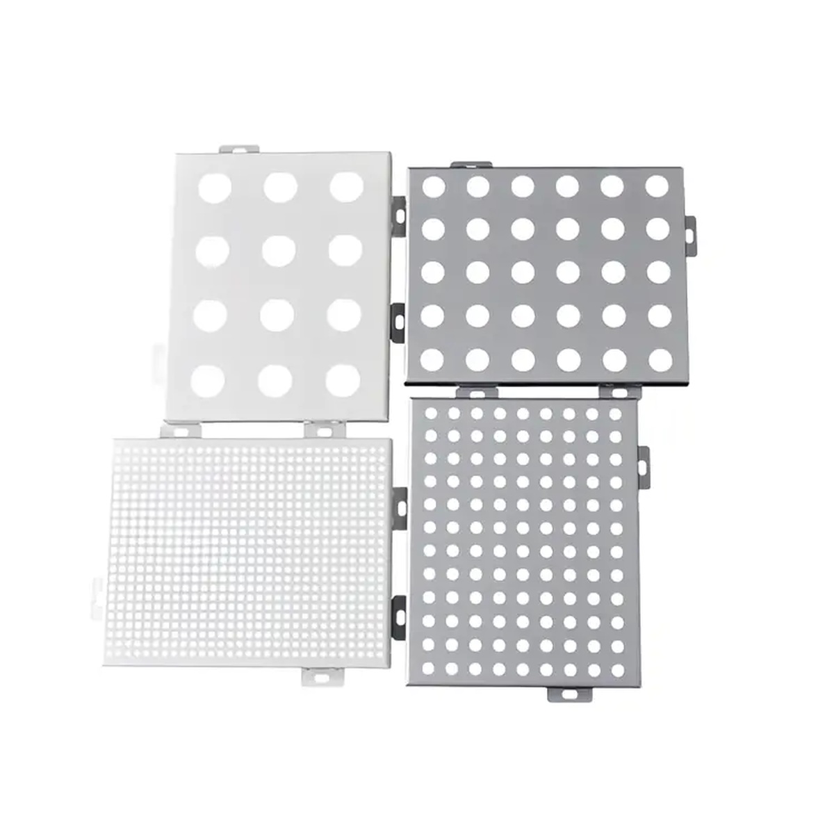 Four perforated metal panel samples with different circular hole sizes